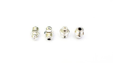 Grease nipple fittings for machine spare parts isolated on the white background. New spare parts.