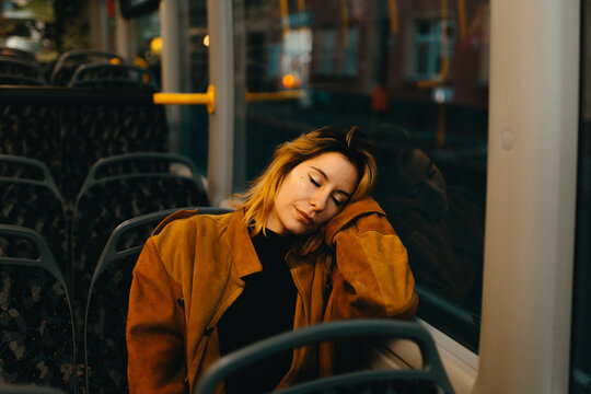 young blonde woman on the bus.