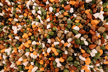 Texture of vibrant multi colored sweet stones. Background made of candies