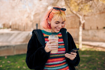 Teenager student checking her phone