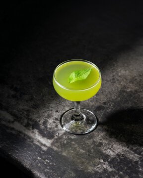 Basil cocktail on a bar