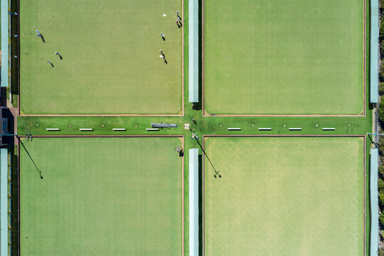 Aerial top down view of four bowling greens