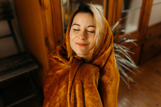 Woman Wrapped In A Blanket