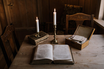 Reading books by candlelight