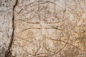 Stone background with antique inscriptions