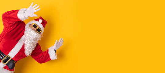 santa claus isolated on background waving joyful