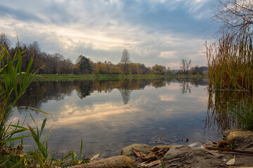 autumn in Pokrovskoe Streshnevo Park with a view of the pond in Moscow