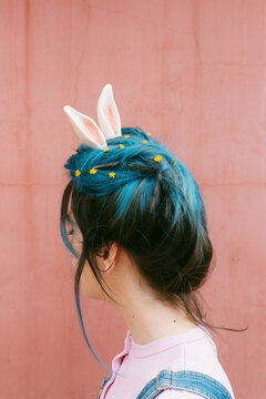 anonymous woman with rabbit ears .