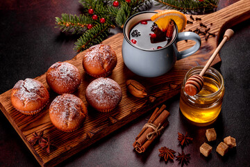 Beautiful delicious fresh cocoa muffins on the Christmas table