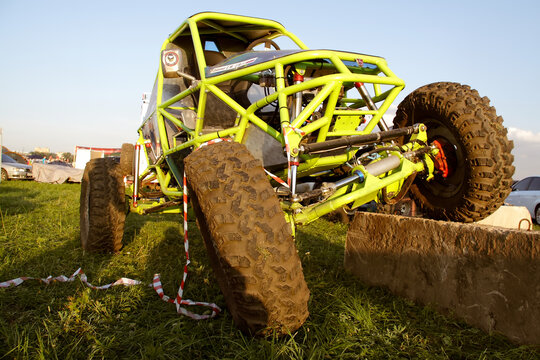 Moscow, Russia - May 25, 2019: Handmade green off-road car. metal frame with attached units. Buggy on the rock