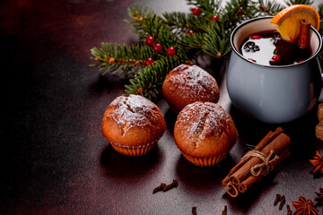 Beautiful delicious fresh cocoa muffins on the Christmas table