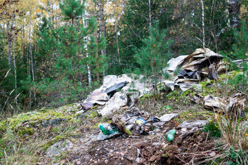 big amount of trash in forest, global environment issues