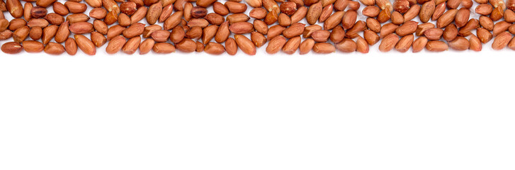 Obraz premium Peanuts banner. Uncleaned inshell nut peanuts isolated on white background. Flat lay, copy space