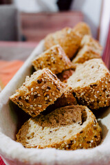 basket of perfectly cut cereal bread slices. Food photography