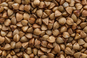 Buckwheat. The concept of diet and healthy eating, the background texture of the buckwheat. Macro photography of buckwheat texture.gluten free ancient grain for healthy diet,top view.