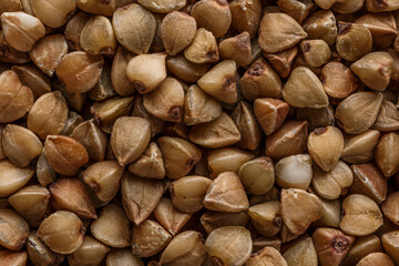 Buckwheat. The concept of diet and healthy eating, the background texture of the buckwheat. Macro photography of buckwheat texture.gluten free ancient grain for healthy diet,top view.