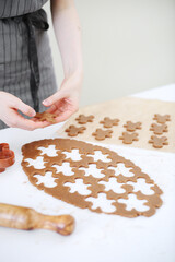Making christmas gingerbread cookies. ginger man cookies making