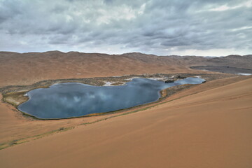 Fototapeta na wymiar Sumu Jaran-Sumu Barun Jaran Lakes among dunes-Badain Jaran Desert-Inner Mongolia-China-1084