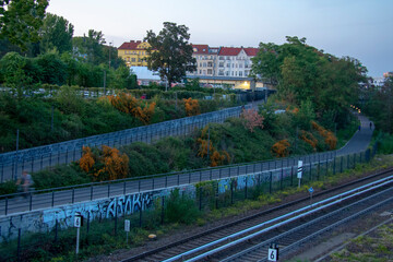 Fototapeta na wymiar Sunset landscape of railway and gleisdreieck park in Schoneberg Berlin Germany