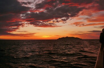 Fototapeta na wymiar Sunset above Ligurian Sea form the deck of a tall ship