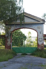 Gateway to old agricultural farmstead in Strahovice village in North Moravia, Silesia, Czech republic