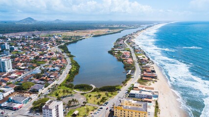 Barra Velha SC. Aerial view of the city, Barra Velha lagoon and Península beach, in Santa Catarina, Brazil © Jair