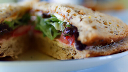 Cheese & ham salad sandwich, close up.