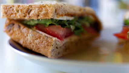 Cheese & ham salad sandwich, close up.
