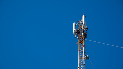 Antenna of Communication Building and blue sky