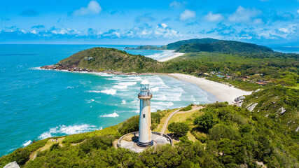 Ilha do Mel - Paraná. Aerial view of the Conchas lighthouse and beaches of Ilha do Mel - obrazy, fototapety, plakaty