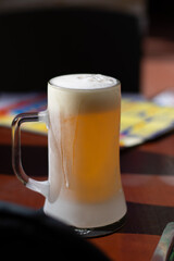Refreshing iced glass of beer
