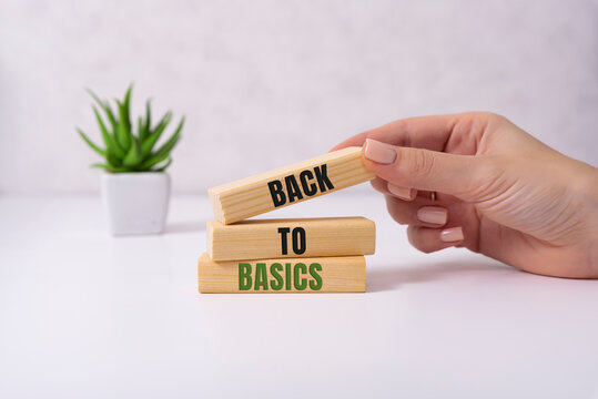 The words back to basics made of letters on wooden blocks. back to basics - fundamental principles concept