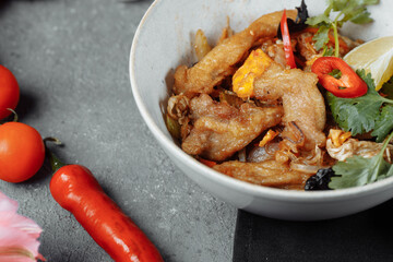 Udon noodles with chicken and peppers - Japanese cuisine
