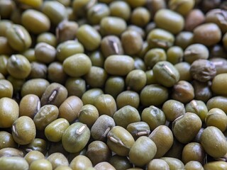 Green bean seed texture, mung bean extreme close up view, bokeh style photography