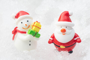 Santa claus and snowman on snow happy Christmas and happy new year day