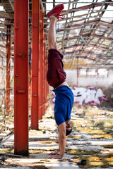 Handstand Push-up Man Workout at Warehouse