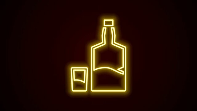Glowing neon line Tequila bottle and shot glass icon isolated on black background. Mexican alcohol drink. 4K Video motion graphic animation