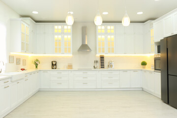 Beautiful view of modern kitchen interior with stylish furniture