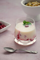 Yogurt with raspberries. Healthy food. Close up.