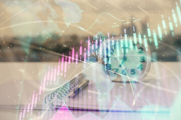 Fototapeta na wymiar Multi exposure of financial graph drawings and desk with open notebook background. Concept of forex