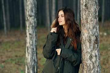 Woman on nature near a tree rest walk to rest