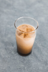 iced coffee with almon milk in tall glass