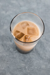 Fototapeta na wymiar iced coffee with almon milk in tall glass