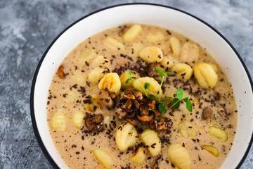 plant-based food, vegan mushroom gnocchi with dairy-free sauce