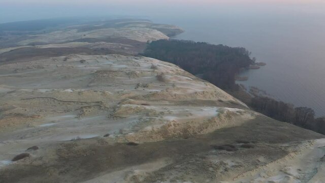 Drone aerial view of Dead Dunes in Neringa, Lithuania. UNESCO World Heritage Site