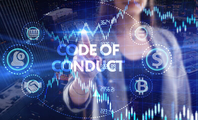 Business, Technology, Internet and network concept. Young businessman working on a virtual screen of the future and sees the inscription: Code of conduct