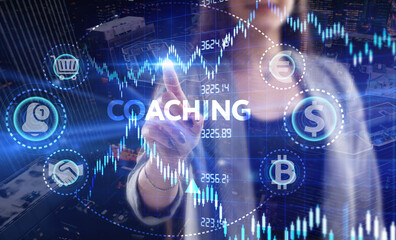 Business, Technology, Internet and network concept. Young businessman working on a virtual screen of the future and sees the inscription: Coaching