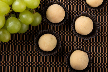 Chocolate truffle white  with green grape filling.