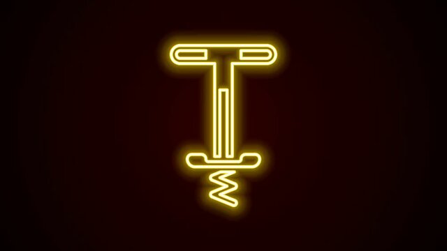 Glowing neon line Pogo stick jumping toy icon isolated on black background. 4K Video motion graphic animation
