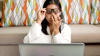 Overworked tired women applying eye drops at home office when they feel pain in dry eyes suffer from poor blurred vision from computer work.